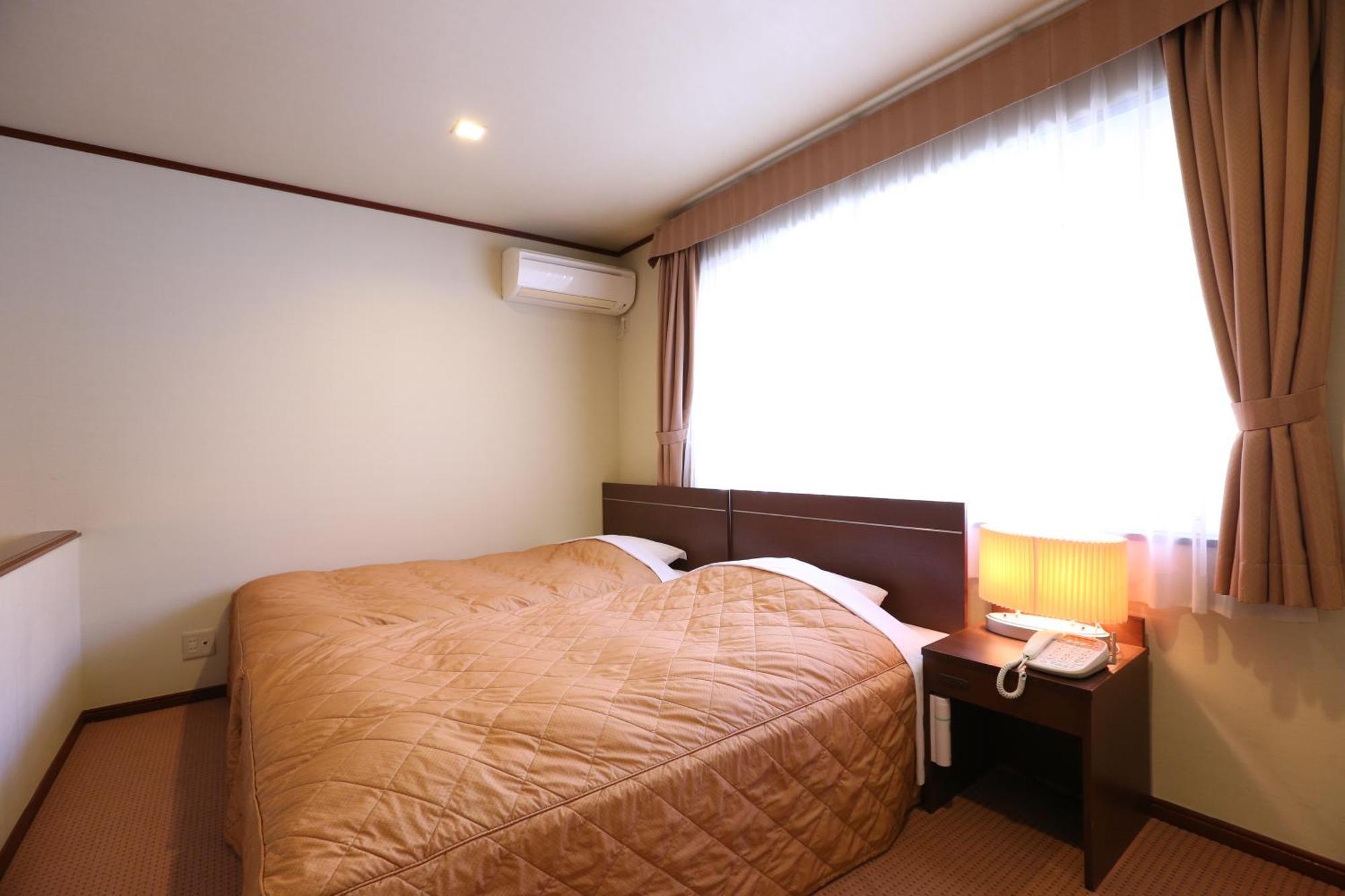 Dormy Club Karuizawa Hotel Værelse billede